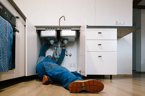 Professional Emergency Plumber technician working in Gradyville, PA